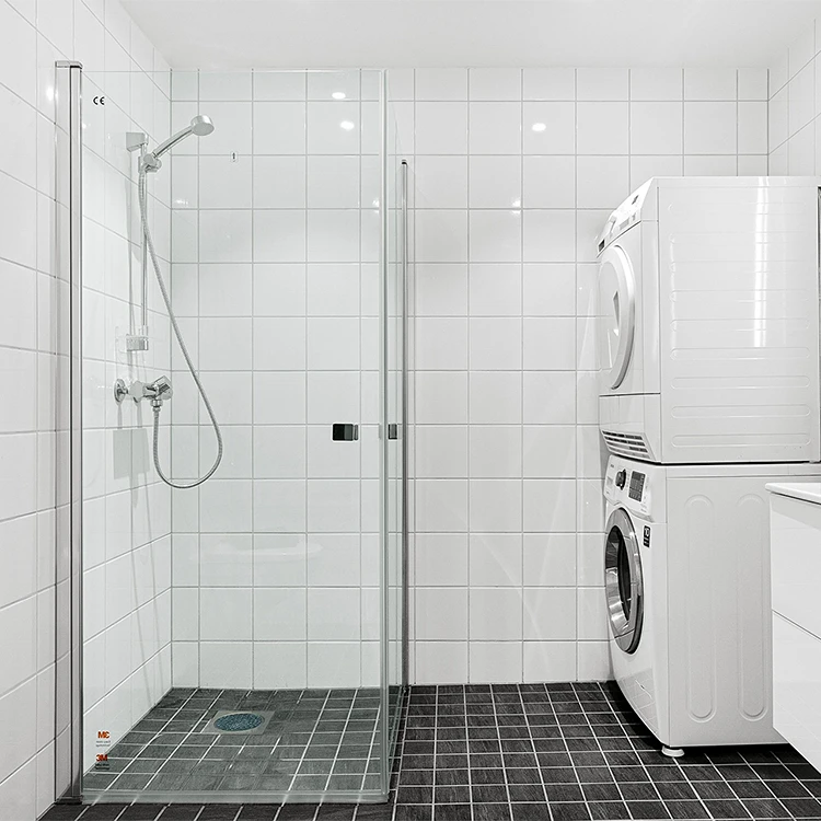 tiled bathroom with laundry