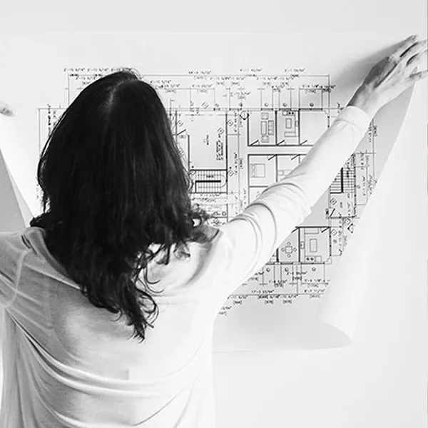 Woman reviewing house plans