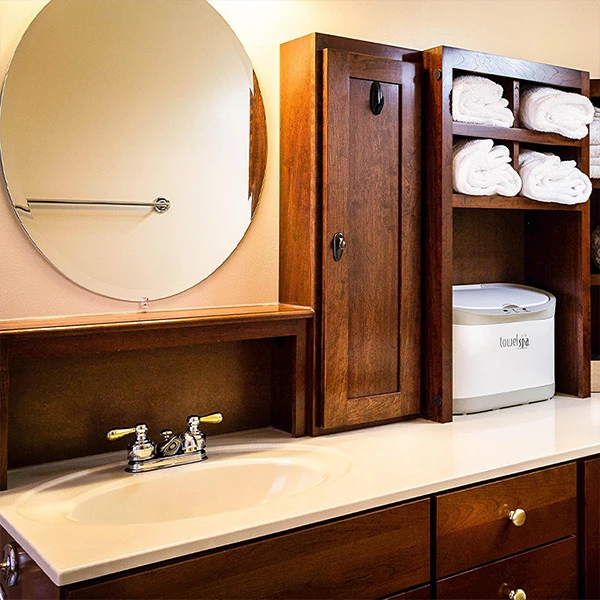 rich wood cabinets in bathroom